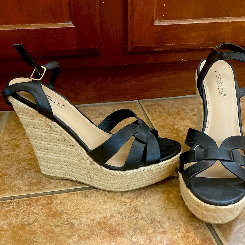 Black wedges with woven tan heal